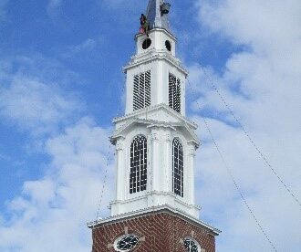Painting and repairing church steeple