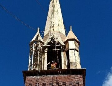 Steeple builders rebuild church steeple destroyed by tornado