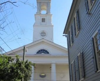 Projects included stucco repairs and painting church and steeple