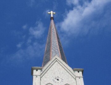 Installed new slate, copper and gold leafed cross on steeple
