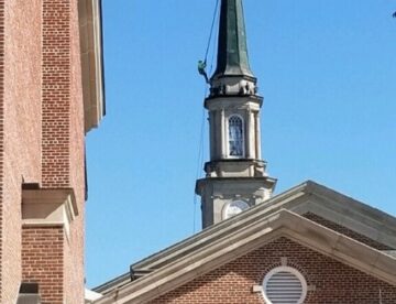 Steeplejack project involving copper spire, painting steeple and performing stone restoration