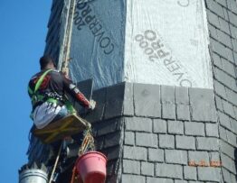 Our steeplejacks installing a faux slate roof on a steeple