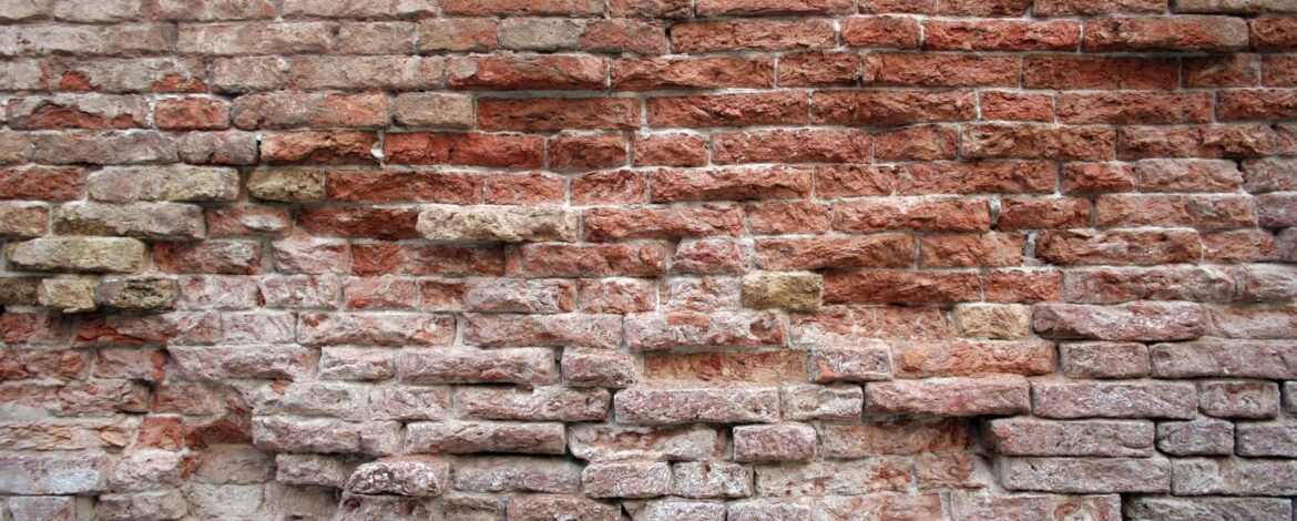 Tuckpointing historic church brick