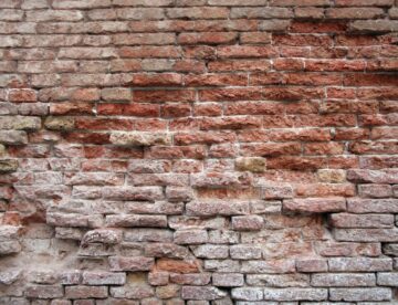 Tuckpointing historic church brick
