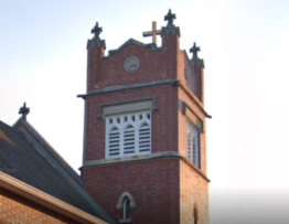 Restored church brick tower