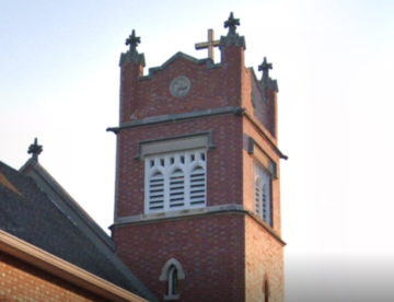 Restored church brick tower